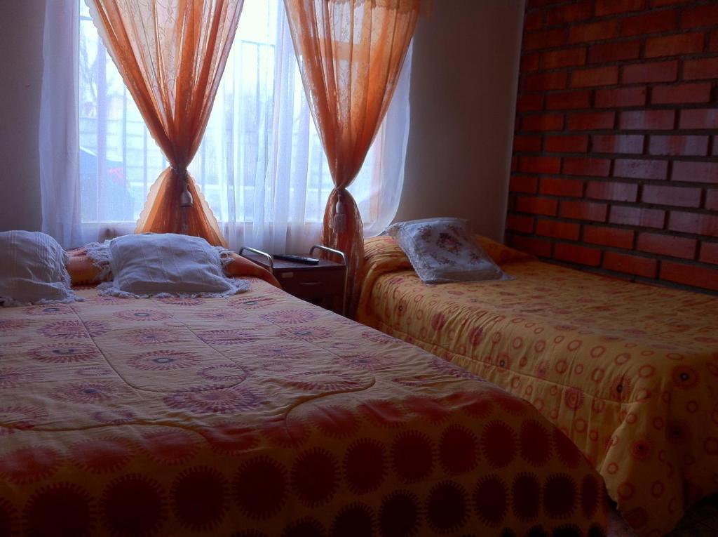 Hostel Melinda Пуерто Наталес Стая снимка