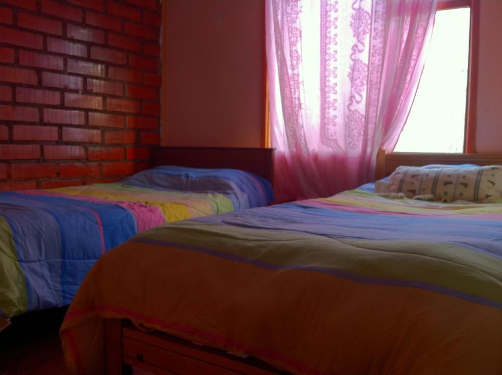 Hostel Melinda Пуерто Наталес Стая снимка