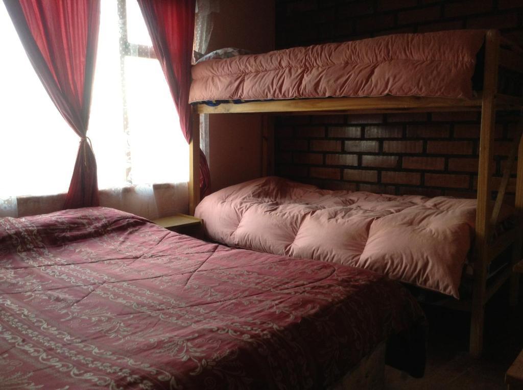 Hostel Melinda Пуерто Наталес Стая снимка